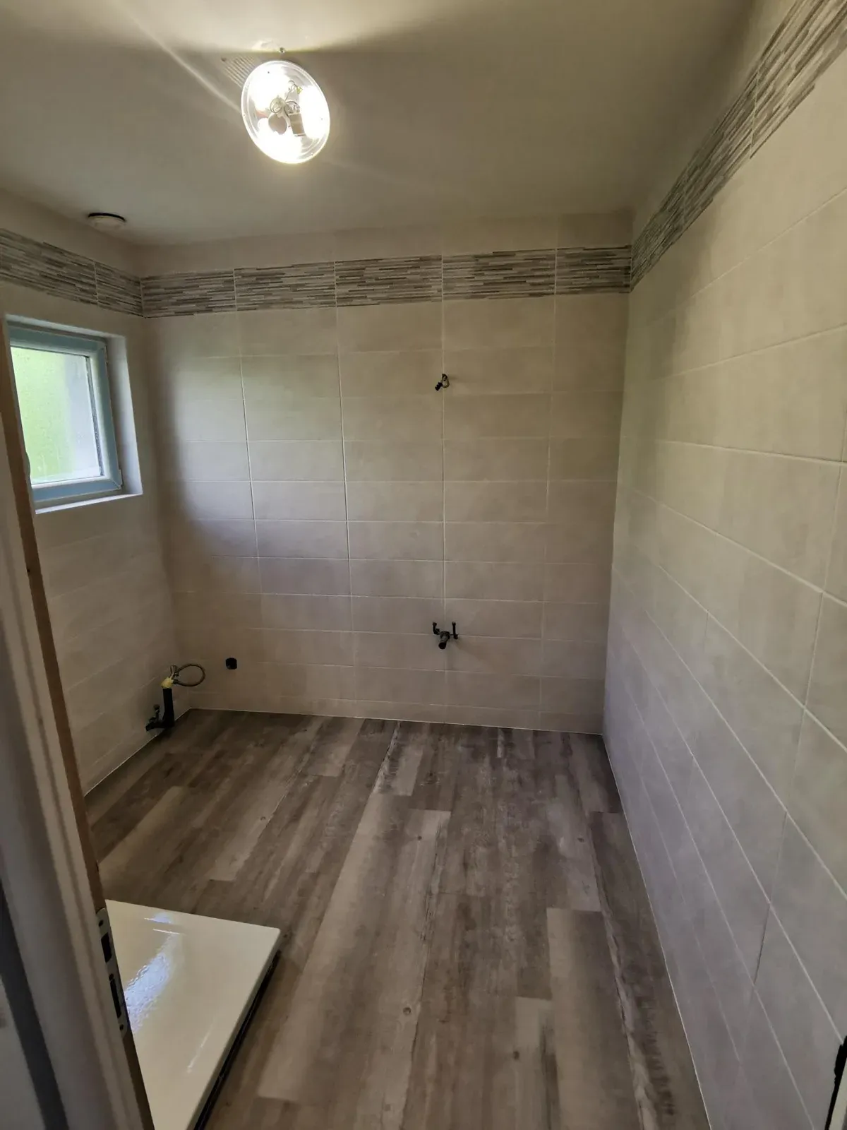 Rénovation complète de salle de bain — après